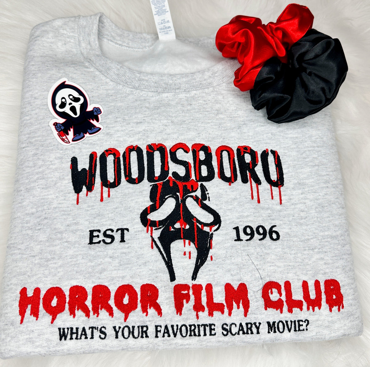 Ash Woodsboro embroidered sweatshirt with Scream-inspired horror design