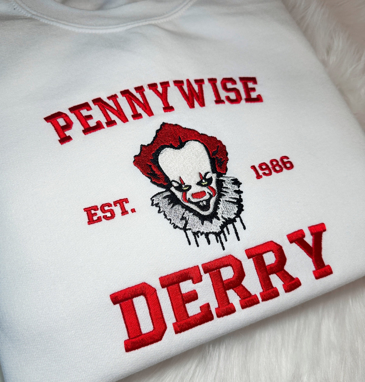 White Pennywise embroidered Halloween sweatshirt with horror clown design
